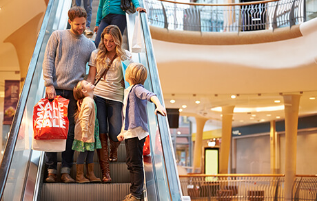 Shoppers Riding Escalators at La Gran Plaza Mall